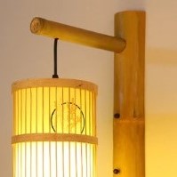 Kinkiet rattanowy cylindryczny z azjatyckim wzorem Kinkiet rattanowy cylindryczny z azjatyckim wzorem