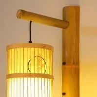 Kinkiet rattanowy cylindryczny z azjatyckim wzorem