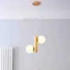 Lampa wisząca LED z drewna i dwiema kulami