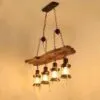 Lampa wisząca z drewna dryfowego w stylu industrialnym z lampionami LED