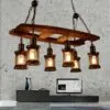 Lampa wisząca z drewna dryfowego z sześcioma lampionami LED