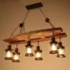 Lampa wisząca z drewna dryfowego z sześcioma lampionami LED