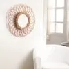 Lustro z rattanu w kształcie kwiatu Lustro z rattanu w kształcie kwiatu