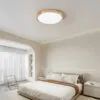 Okrągła lampa sufitowa LED z efektem drewna